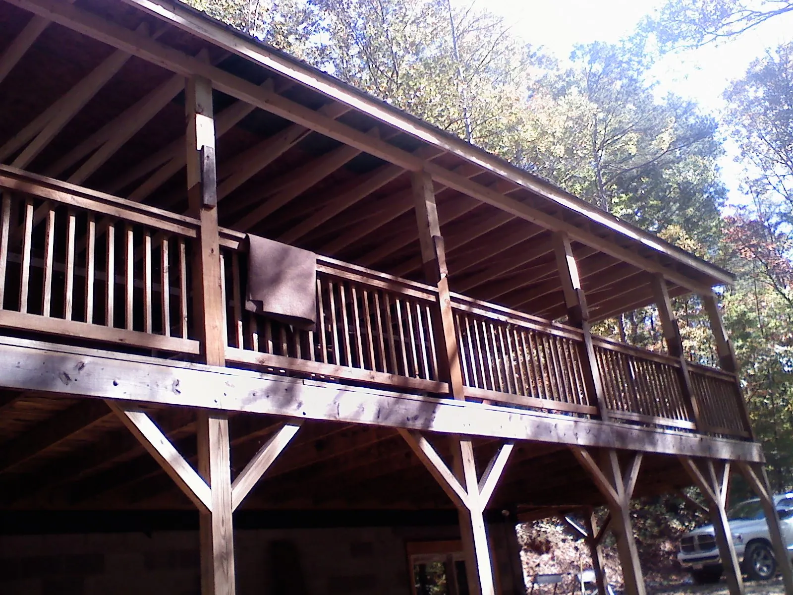 Timber framing under a new elevated porch and deck — Roof Leak Repair in Towanda by Roofing Brothers